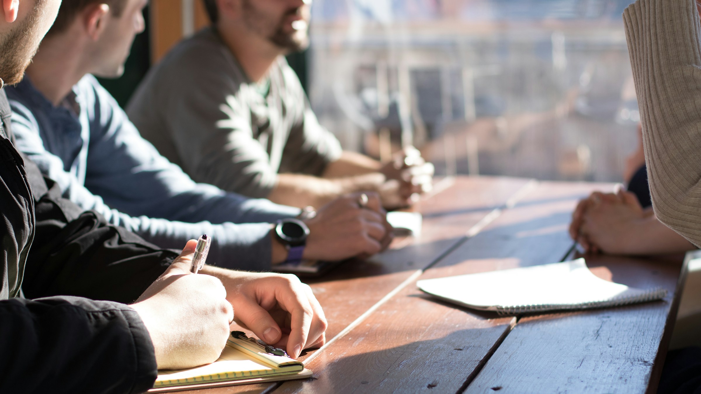 Startup team meeting around a conference table